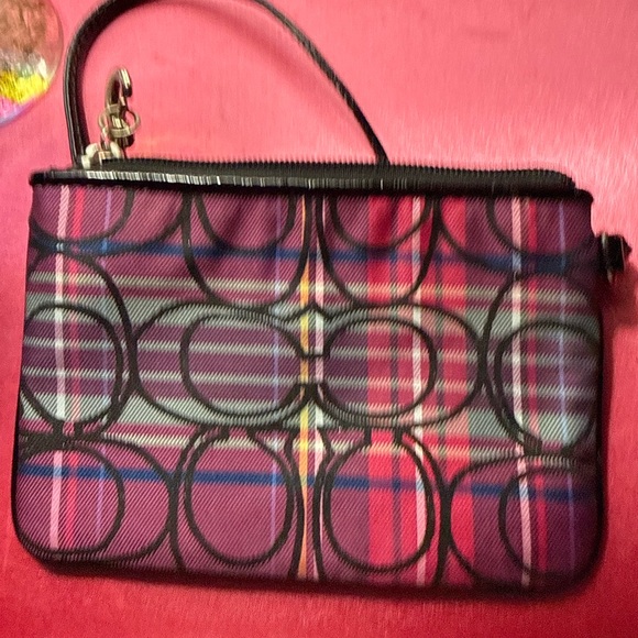 Y2K Coach Poppy Wristlet Collection Heart Design with Graffiti Script.